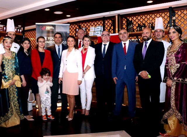 spouse-of-turkish-ambassador-in-red-jacket-along-with-members-of-management-hotel-shangrila-doha
