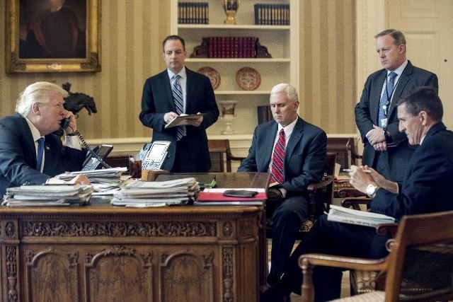 Michael Flynn seen on extreme right in a meeting with Trump and his team Pic AP 28 Jan 2017