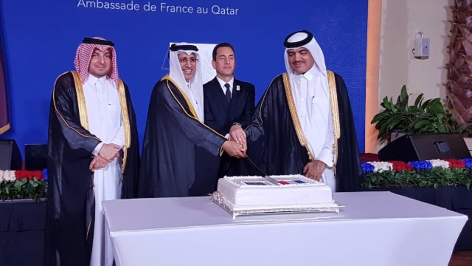 Minister of Justice and Minister of Environment of Qatar cutting French National Day Cake along with amb Eric Chevellier and amb Ibrahim Fakhroo, Chief of Protocol of Qatar