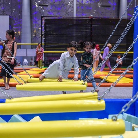 The child trying out the obstacle course at Summer Entertainment City. The two month event features the world’s largest obstacle course, along with Qatar’s largest trampoline park