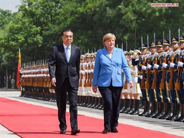 Xi Meets Merkel, Calls for Higher-level China-Germany Ties