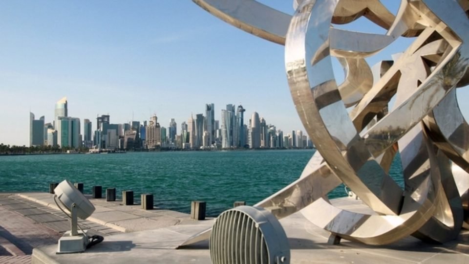 FILE PHOTO: Buildings are seen from across the water in Doha