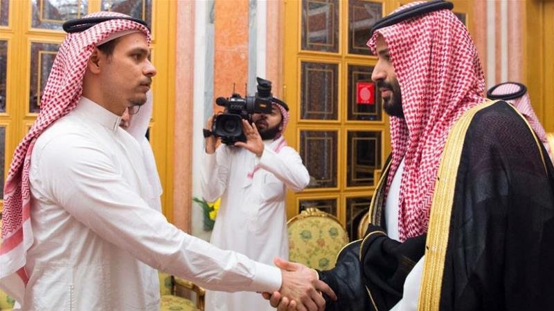Salah Khashoggi shakes hands with Crown Prince Mohammed bin Salman after being invited to receive condolences Courtesy Saudi Press Agency