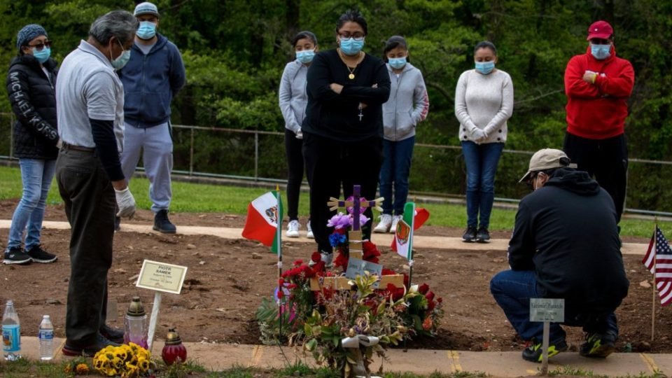 Angelli Gonzalez and her family visited grave of Maria Gonzalez, at St. Peter’s Cemetery, Staten Island, Pic New York Times