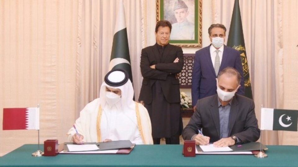 AlKaabi and Syed Taha signs additional agreement while Prime Minister Imran Khan watches